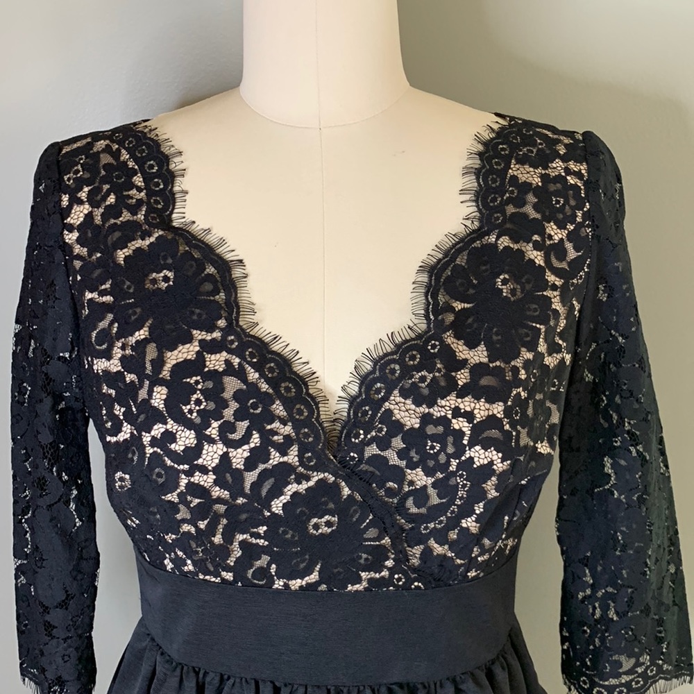 NWT Black dress with lace at bodice & sleeves. Fully lined. No lining at sleeves
